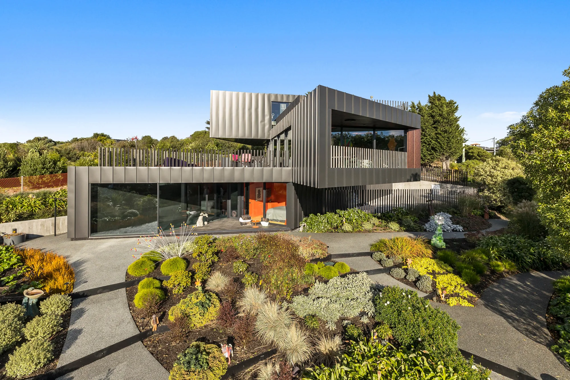 Architectural home within landscaped grounds