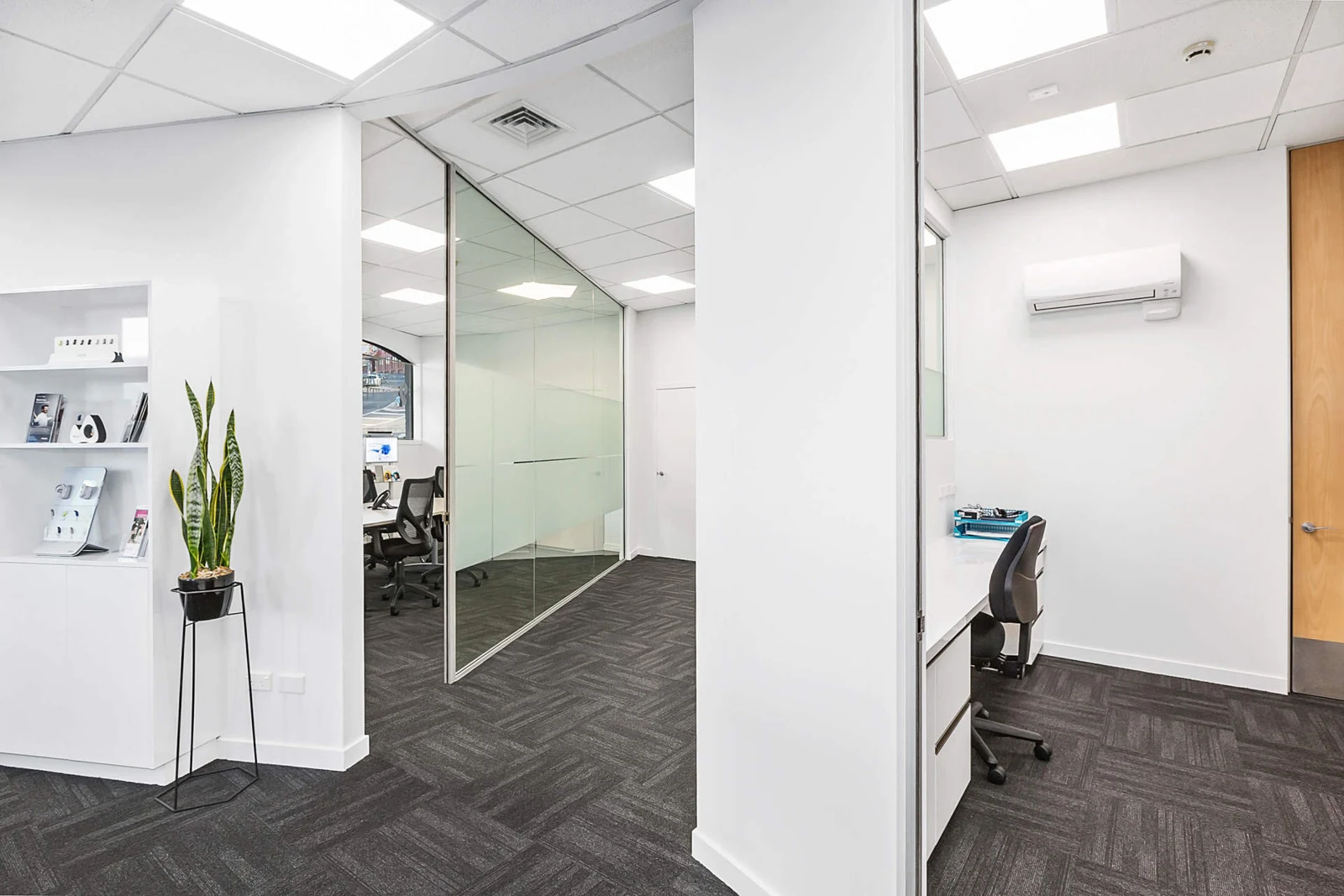 Southern Audiology clinic interior with reception counter and glazed partitions